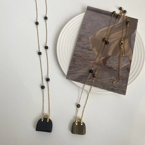 Tigerauge und Obsidian Mini Tasche Anhänger an Goldkette für Damen im Set