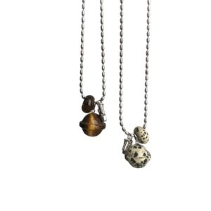 Collana Saturno in acciaio al titanio con occhio di tigre e pietra maculata argento