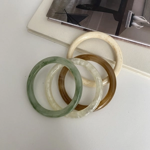 Minimalist resin bangle set in marble green ivory amber and pearlescent white