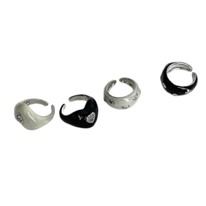 Set of four adjustable enamel rings featuring heart zircons and chic marble textures
