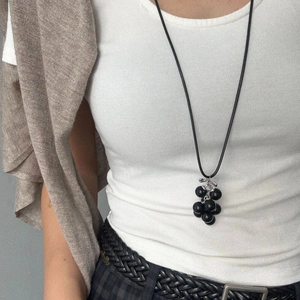 Minimalist long black grape cluster pendant necklace with silver leaf and cord strap