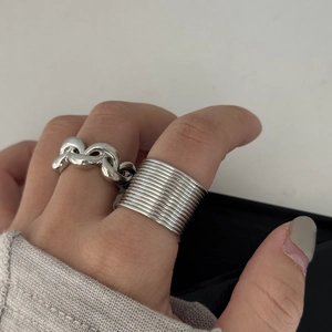 Polished silver geometric open rings featuring chunky chain and minimalist layered designs