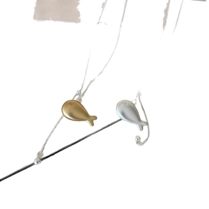 Minimalist gold and silver fish pendant necklaces with sleek snake bone chains