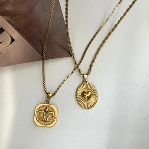 Collane retrò in acciaio placcato oro 18K con ciondoli a giglio e cuore vintage
