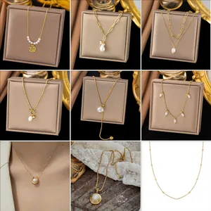 French style gold pearl necklace set with minimalist pendants and elegant link chains