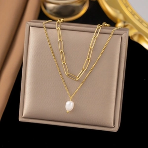 Double-layer gold necklace with paperclip chain and white teardrop pearl pendant