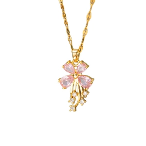 Halskette mit rosa Herz-Zirkonia-Blume und eleganten goldenen Quasten auf einer Wellenkette