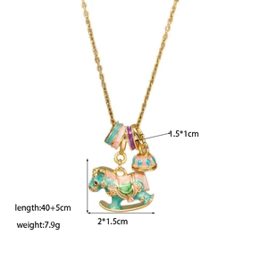 Detail shot of golden enamel rocking horse pendant with colorful beads and dimensions