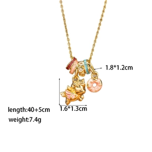Detail of gold enamel necklace with pink rocking horse, donut charms and dimensions