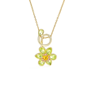 Elegant floral necklace with olive green petals and pink crystal accents on a gold chain