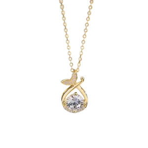Elegant gold mermaid tail pendant necklace featuring a sparkling round zircon center stone