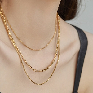 Three-layer layered gold titanium steel necklace featuring a trendy paperclip chain design