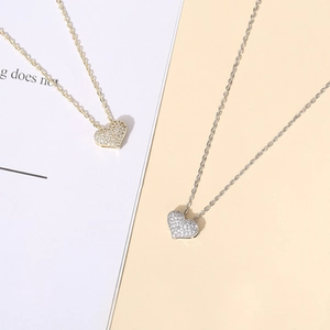 Sparkling micro-pave heart necklace in 14K gold and silver finishes for women