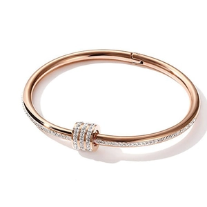 Bracciale rigido in acciaio al titanio oro rosa con zirconi e design a onde da donna