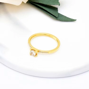 Elegant gold titanium steel ring with round zircon and micro-paved diamond accents on sides