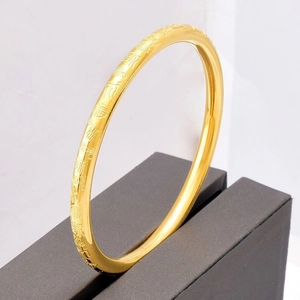 Golden Chinese style titanium steel bracelet with engraved Fu pattern in vintage design