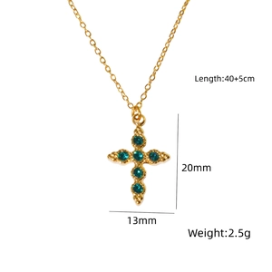 Detail of 40cm gold cross necklace with six inlaid green crystals and 5cm extender