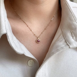 Vintage 14K gold plated stainless steel necklace with faceted deep red gemstone pendant