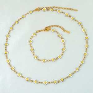 Titanium steel 18k gold necklace and bracelet set featuring white daisy enamel charms