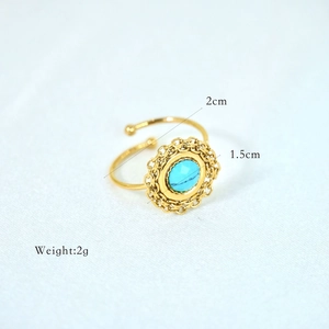 Detailed view of bohemian gold open ring showing size measurements and turquoise stone