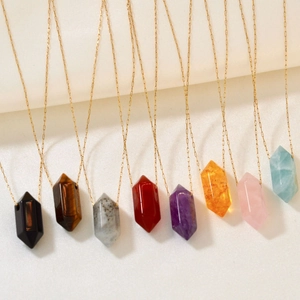 Set of eight hexagonal natural stone bullet pendants on elegant gold stainless steel chains