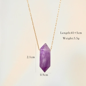Detail view of purple crystal bullet pendant with dimensions 2.1cm height and 0.9cm width