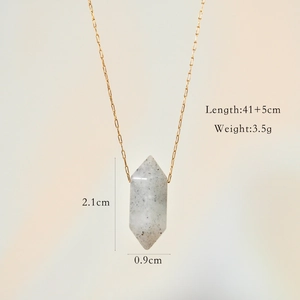 Detailed macro view of hexagonal stone pendant necklace with dimensions and size marking
