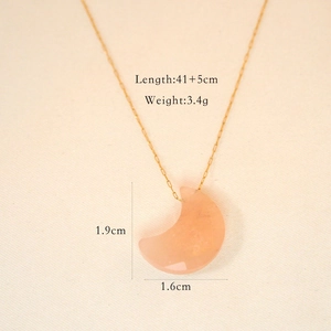 Detail of pink crystal moon pendant on a gold chain with precise dimensions and weight