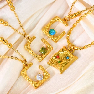 Conjunto de collar chapado en oro de 14k vintage con circonitas de colores en seda