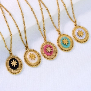 Detailed view of five colorful natural stone oval star pendants with 14k gold plated chain