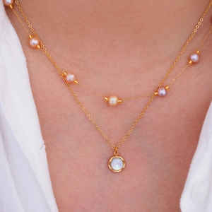 Double layered 14k gold plated stainless steel necklace with pink pearls and shell pendant
