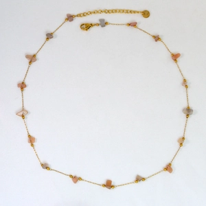 Detail of stainless steel necklace with natural colorful stones and lobster clasp closure