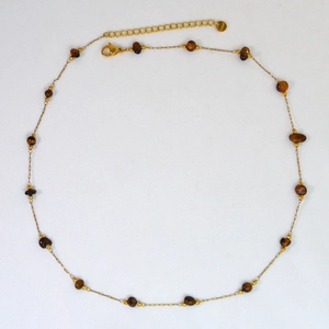 Detailed view of handmade stainless steel chain with natural brown stone beads and lobster clasp