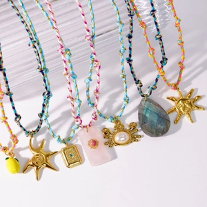 Hand-woven colorful cord necklaces featuring gold titanium pendants and natural stone charms