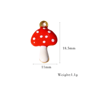 Detailed size specifications of the red mushroom pendant with white dots and gold ring