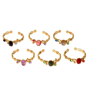 Set of six gold stainless steel open rings with colorful oval natural stones and engravings