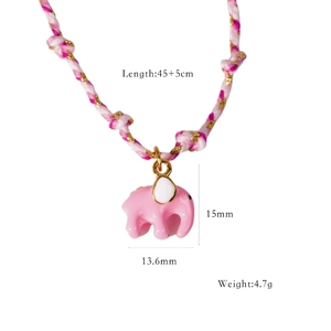 Close-up of pink elephant pendant with detailed dimensions 13.6mm by 15mm on cord