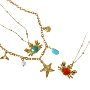 Golden ocean theme necklaces with crab, starfish, and pearl charms for summer