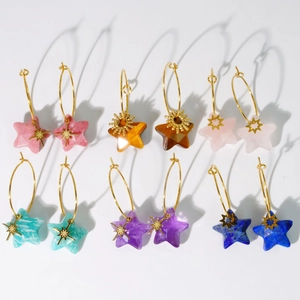 Star natural stone pendants on gold hoop earrings in assorted colors and patterns