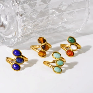 Three-stone gold oval natural stone rings set in blue, tiger eye and turquoise