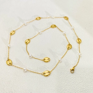 18k gold plated stainless steel pearl necklace with pig nose links on white background