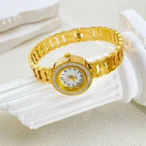 Elegant gold stainless steel hollow bangle watch with rhinestones and white quartz dial