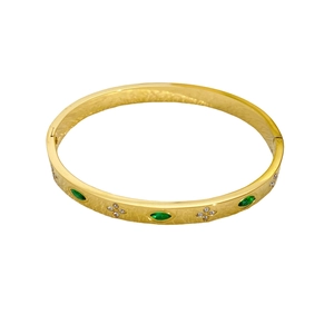 Golden titanium steel clover bracelet with emerald green stones and diamond accents