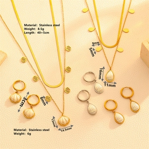 Detailed view of dual-layer stainless steel shell necklaces and water drop earrings set