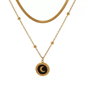 Double-layered gold snake chain necklace with a black round moon pendant and beaded layers