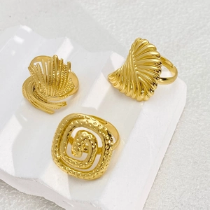 Three-piece gold titanium steel adjustable rings set with unique textured artistic designs