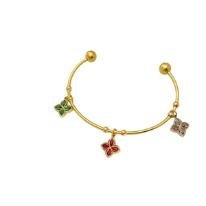 Golden open bangle with three colorful clover pendants in emerald green, ruby red, and purple
