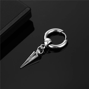 Detailed macro view of polished stainless steel silver hoop earring with spike pendant