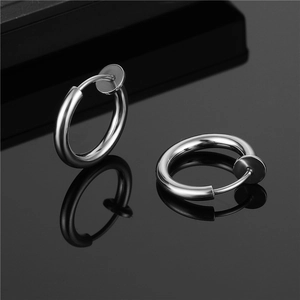 Polished stainless steel non-piercing clip-on hoop earrings on a reflective black background