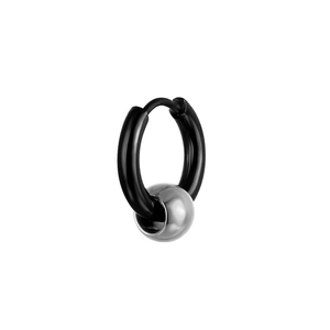 Macro detail of black titanium hoop earring with a sliding silver polished metal bead